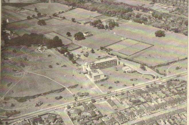 An aerial view over the Civic Centre and Brumby Sports Ground in the late 1960s